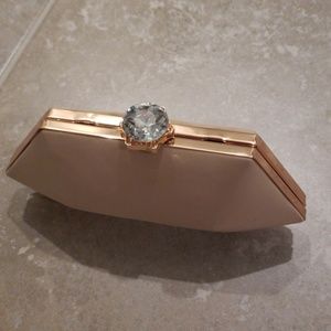 Rose gold clutch